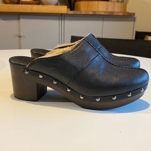 Ugg fur lined black leather studded high heeled clogs